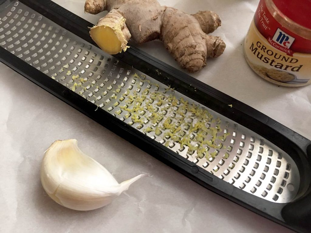 garlic frozen ginger and microplaner