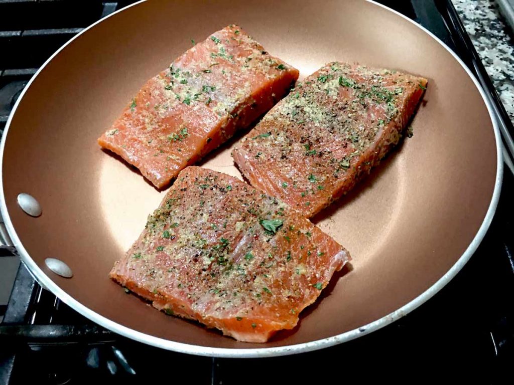 place salmon in pan